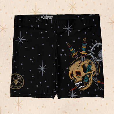 Flat front view of the Overkill Tattoo Biker Shorts showing a large American Traditional Tattoo skull graphic with daggers and a spiked mace.