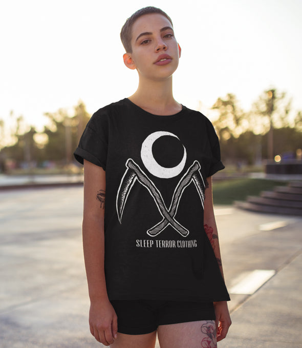 Sleep Terror Clothing Moon Cult T-shirt | Black occult t-shirt for women featuring a crescent moon above a pair of sickles